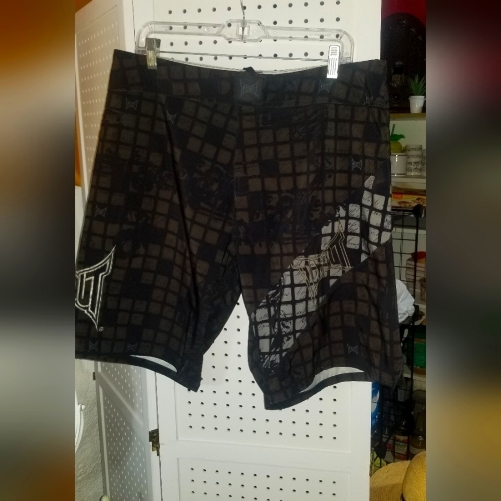 2-4-10$ Mens Tap out  shorts